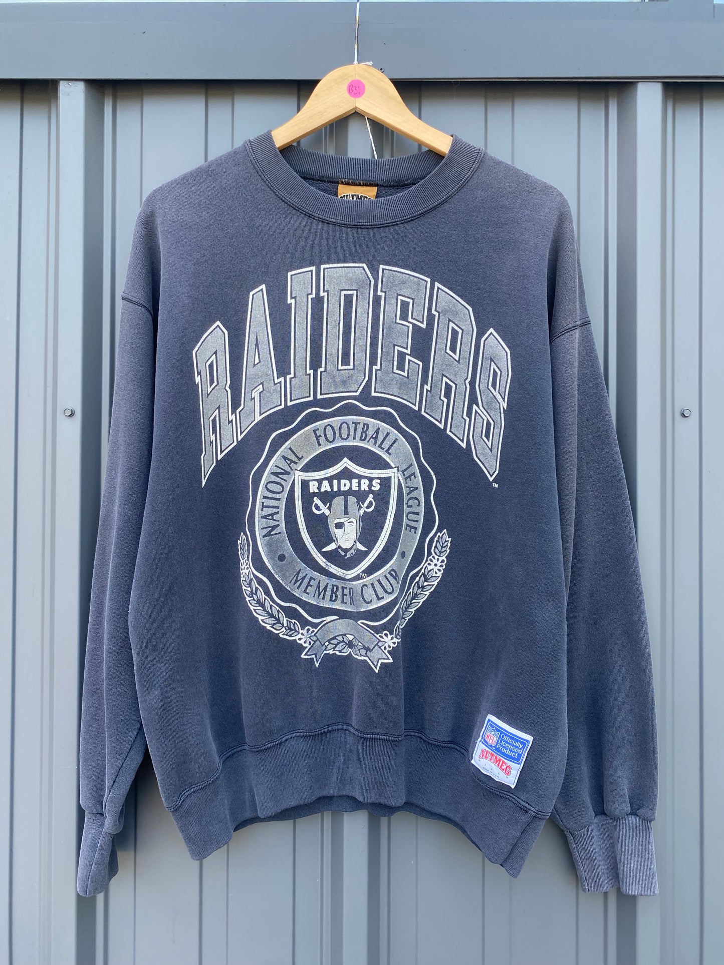 Vintage 90’s Nutmeg Mills Raiders NFL Faded Black Crewneck ( XL )