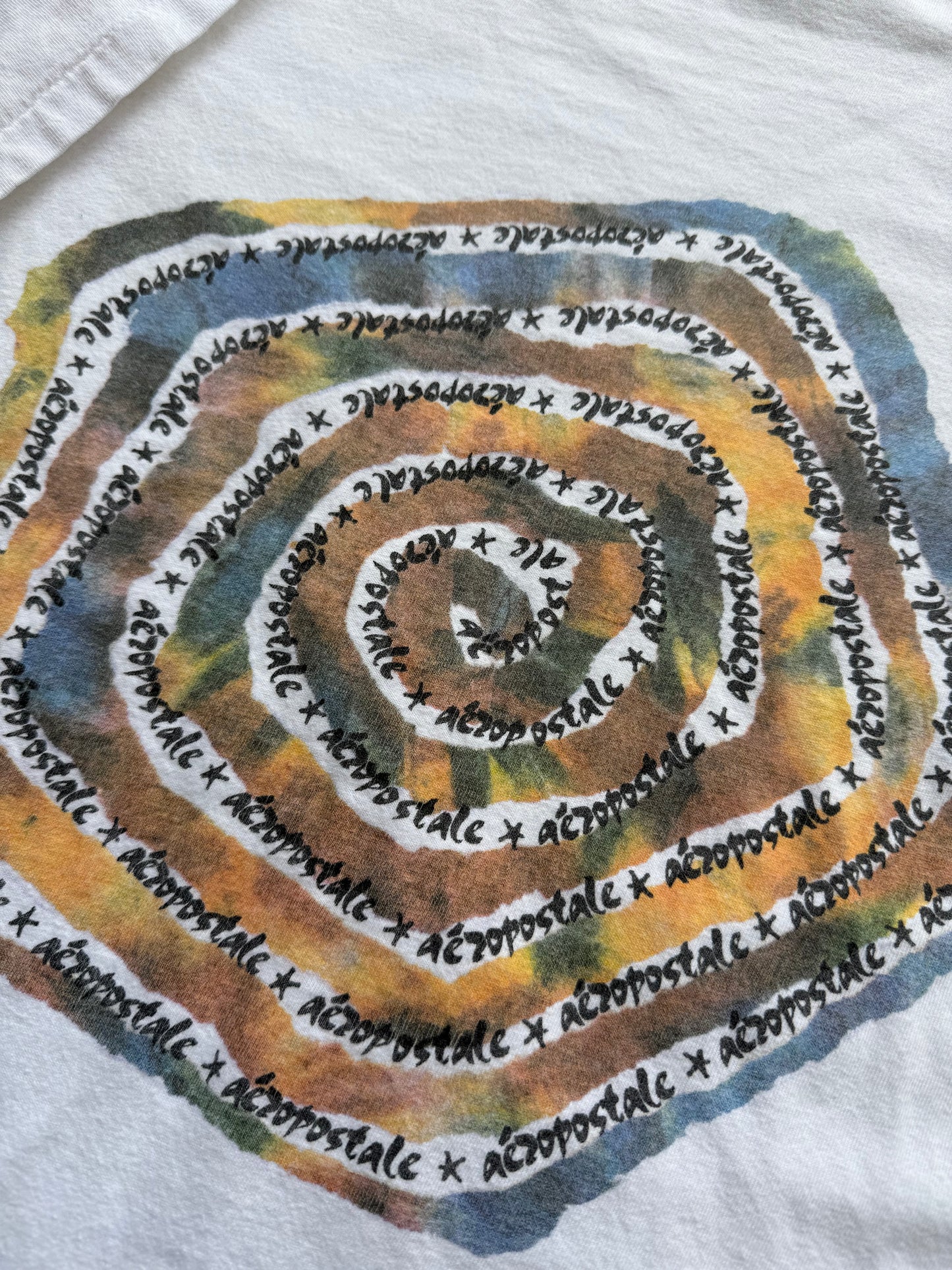 Vintage 1990s Aéropostale Obscure Swirl Art Tee ( XL )