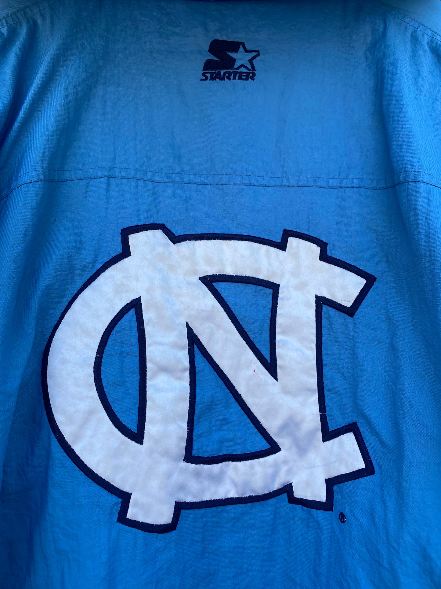 Vintage 90’s Starter Carolina Tarheels Starter Jacket FLAWED ( XL )