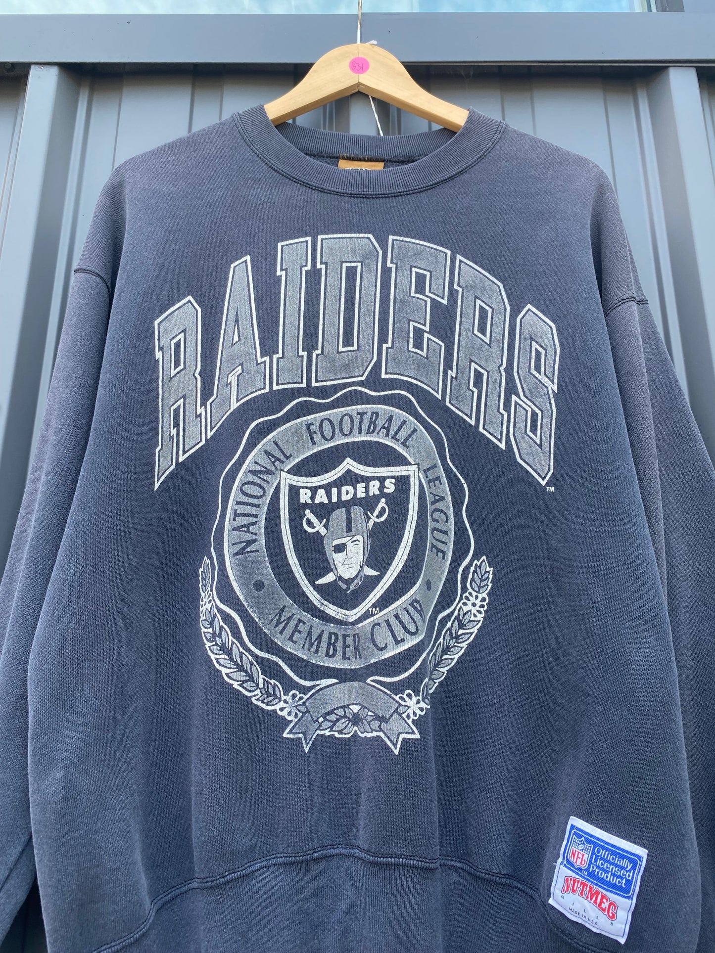 Vintage 90’s Nutmeg Mills Raiders NFL Faded Black Crewneck ( XL )